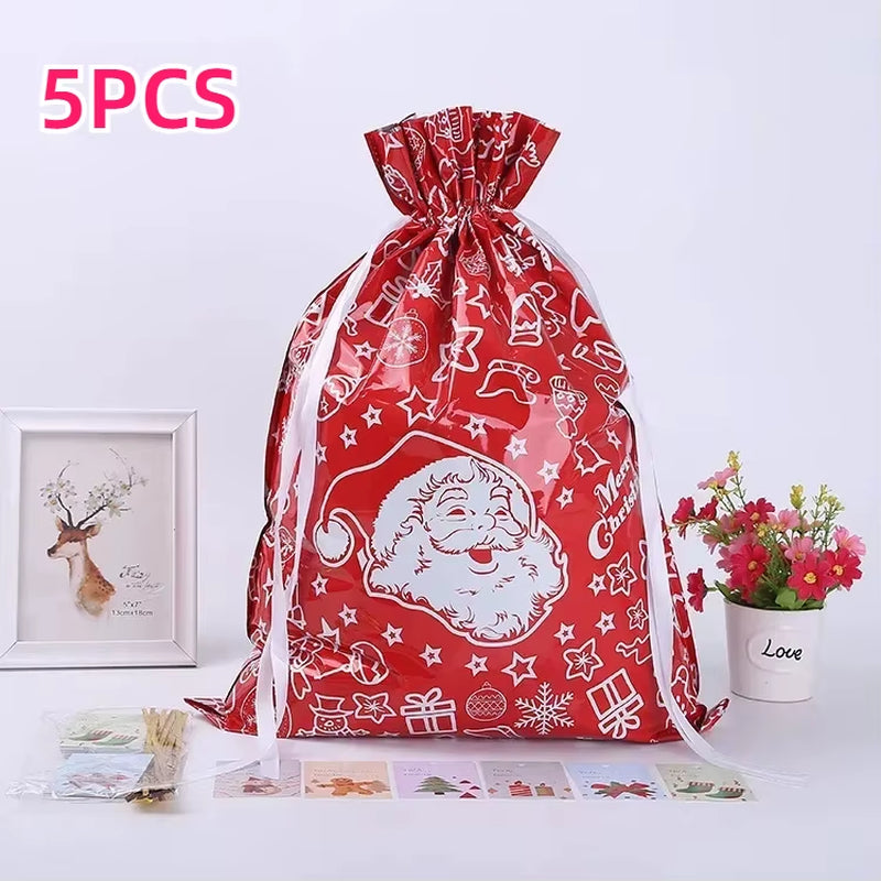 Elevate Your Holiday Spirit with 5PCS Christmas Drawstring Foil Gift Bags - Perfect for Presents and Party Favors!